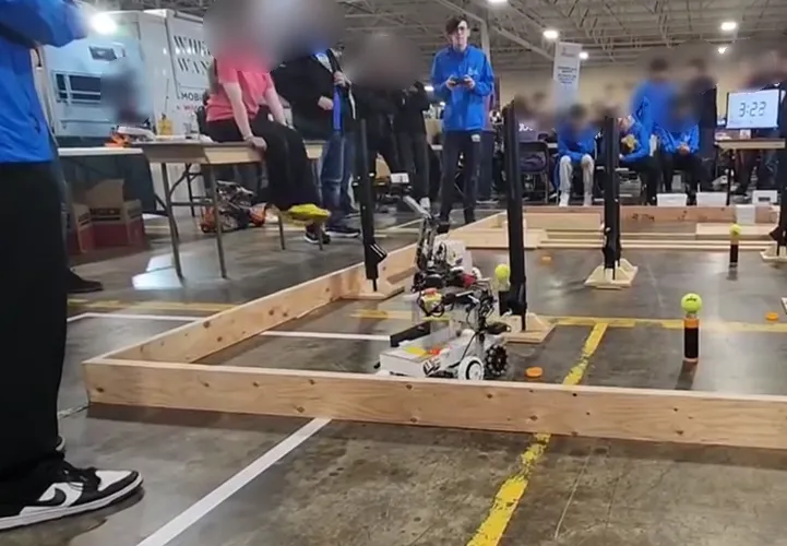 Me in the background, with us in the middle of a competition at Skills Ontario!