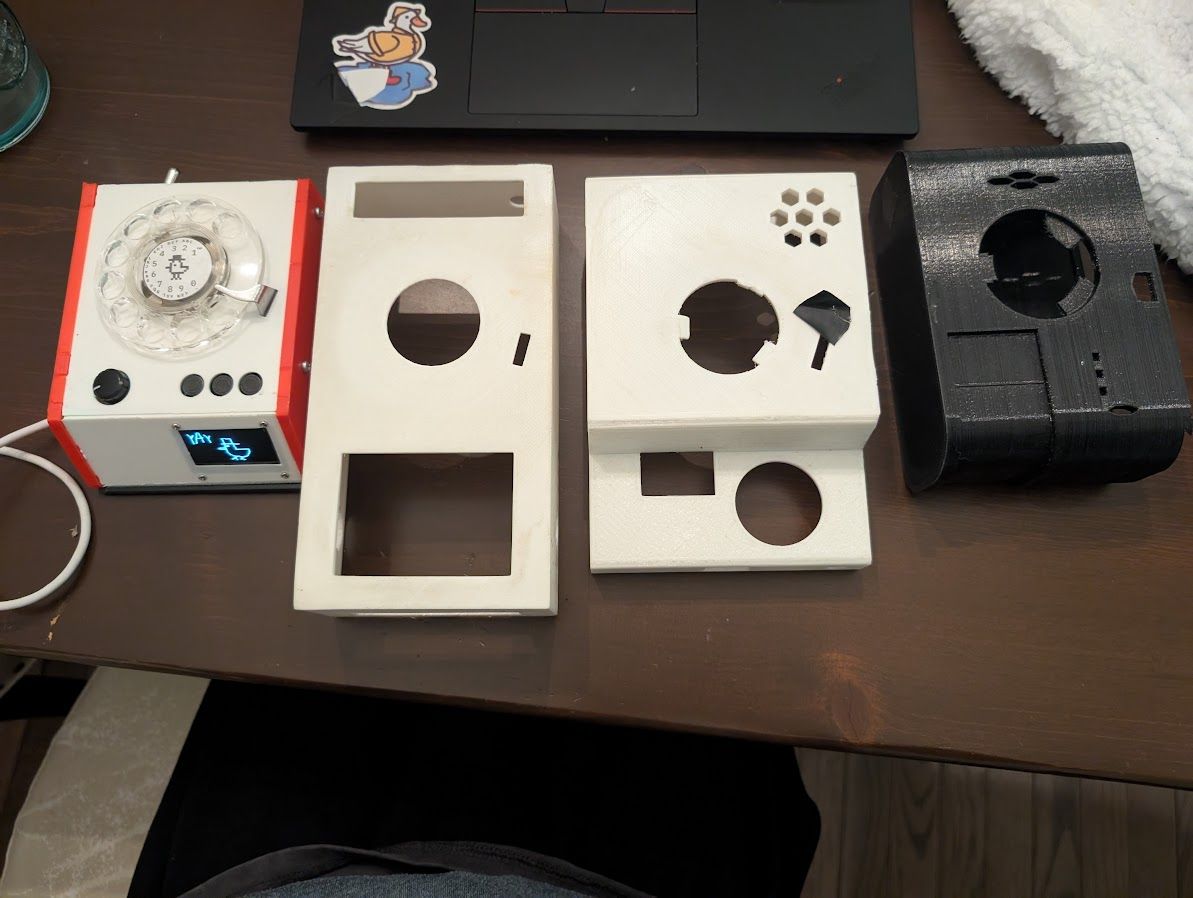 A photo showing the version two to five versions side by side, showing the iteration and size reduction 